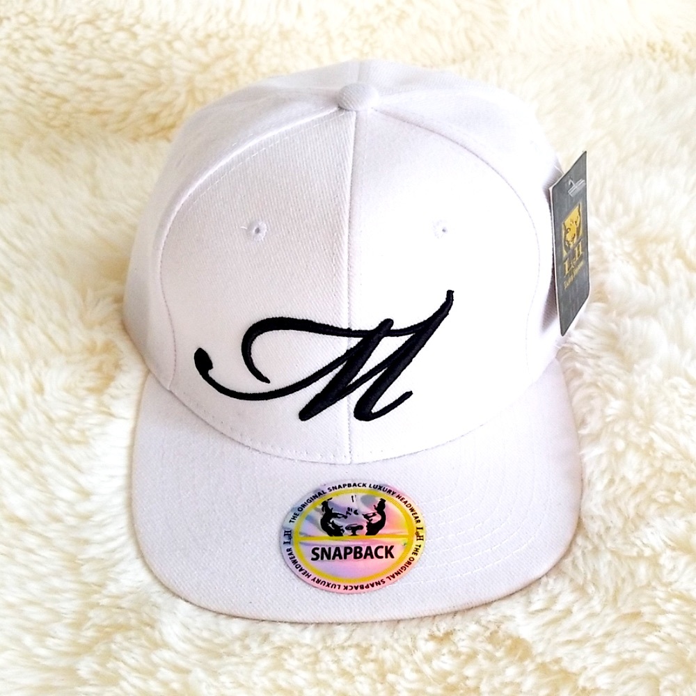 The original snapback luxury headwear, white cap/hat.